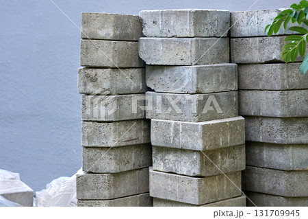 Construction.Stacked paving slabs ready to be laid on the road 131709945