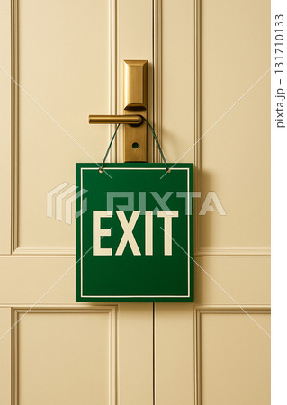 Exit sign on brass door handle in hotel interior 131710133