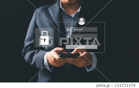 Businesswoman is securing laptops and protecting personal data through virtual interfaces, preventing online theft by applying key cybersecurity. UX design, mobile apps, User login interface concept. Businesswoman is securing laptops and protecting personal data through virtual interfaces, preventing online theft by applying key cybersecurity. UX design, mobile apps, User login interface concept. 131711574