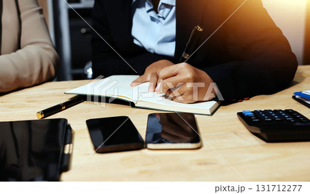 Accounting company provide finance and taxation planning for profitable cash flow, Auditor and accountant team working in office, analyze financial data and accounting record with calculator.Insight Accounting company provide finance and taxation planning for profitable cash flow, Auditor and accountant team working in office, analyze financial data and accounting record with calculator.Insight 131712277