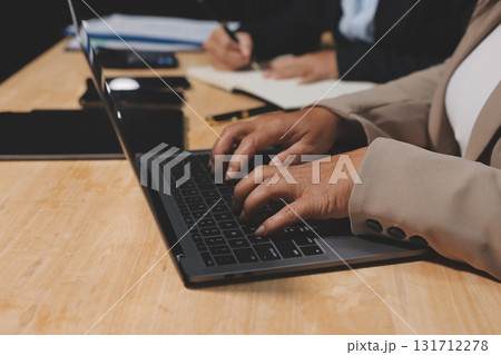 Accounting company provide finance and taxation planning for profitable cash flow, Auditor and accountant team working in office, analyze financial data and accounting record with calculator.Insight 131712278