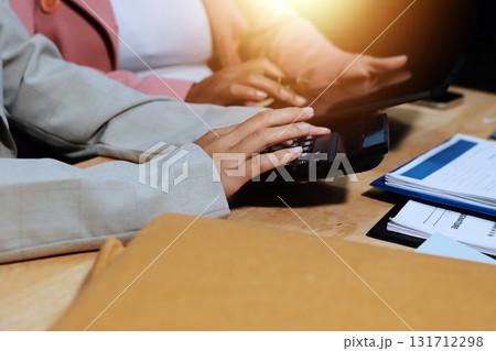 Accounting company provide finance and taxation planning for profitable cash flow, Auditor and accountant team working in office, analyze financial data and accounting record with calculator.Insight Accounting company provide finance and taxation planning for profitable cash flow, Auditor and accountant team working in office, analyze financial data and accounting record with calculator.Insight 131712298