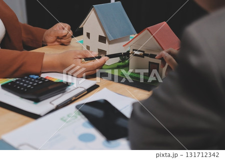 Accounting company provide finance and taxation planning for profitable cash flow, Auditor and accountant team working in office, analyze financial data and accounting record with calculator.Insight Accounting company provide finance and taxation planning for profitable cash flow, Auditor and accountant team working in office, analyze financial data and accounting record with calculator.Insight 131712342