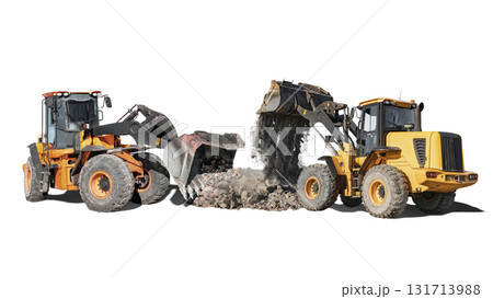 Heavy machinery working together to move dirt at a construction site during the bright daytime 131713988