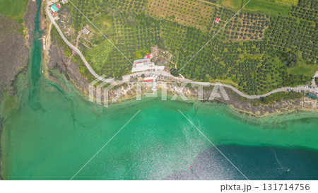 Lake Kournas in Crete aerial view of pedal boat rental clear water and scenic Greek nature. Lake Kournas in Crete aerial view of pedal boat rental clear water and scenic Greek nature. 131714756