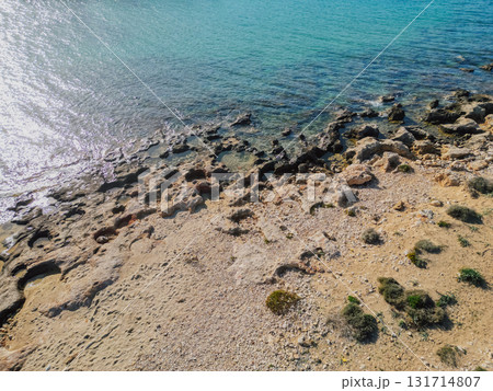 Rocky coastline on Crete island with crystal clear azure sea water under the summer sun. Rocky coastline on Crete island with crystal clear azure sea water under the summer sun. 131714807