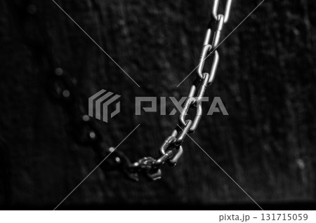 The heavy chain made of durable metals emphasizes the strength of the structure The heavy chain made of durable metals emphasizes the strength of the structure 131715059
