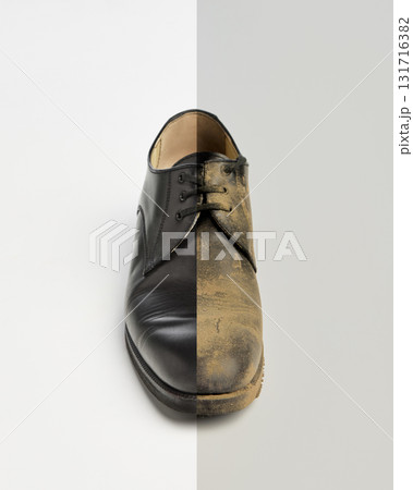 Polished and dusty black shoe showing before and after cleaning contrast collage 131716382