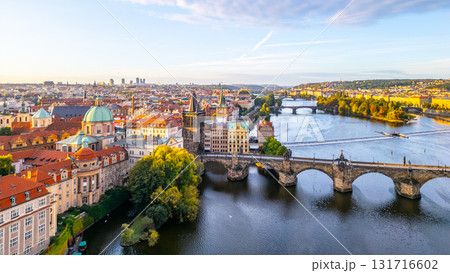 This captivating aerial scene showcases Charles Bridge in Prague, with its historic architecture and vibrant cityscape. This captivating aerial scene showcases Charles Bridge in Prague, with its historic architecture and vibrant cityscape. 131716602