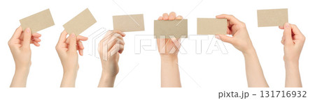 Set of human hand holding craft business card isolated on transparent background Set of human hand holding craft business card isolated on transparent background 131716932
