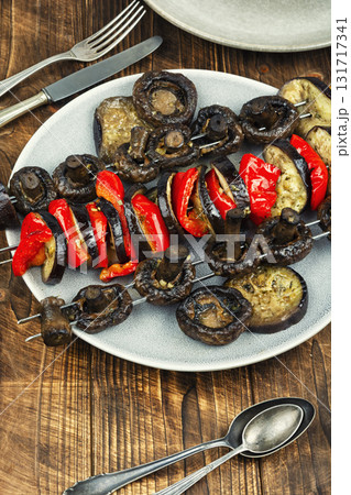 Grilled skewers with vegetables, barbecue grill. 131717341