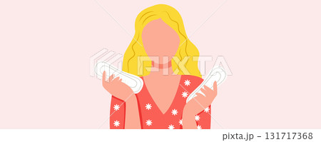 Girl holding sanitary pads on pink background. Women period and menstruation concept 131717368