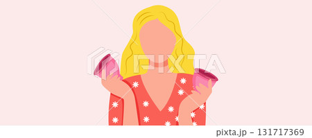Woman holding a menstrual cups on pink background. Menstruation and women health concept 131717369