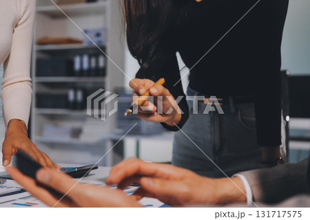 Accounting company provide finance and taxation planning for profitable cash flow, Auditor and accountant team working in office, analyze financial data and accounting record with calculator.Insight Accounting company provide finance and taxation planning for profitable cash flow, Auditor and accountant team working in office, analyze financial data and accounting record with calculator.Insight 131717575