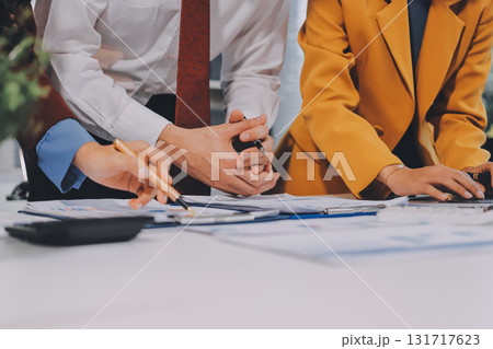 Accounting company provide finance and taxation planning for profitable cash flow, Auditor and accountant team working in office, analyze financial data and accounting record with calculator.Insight Accounting company provide finance and taxation planning for profitable cash flow, Auditor and accountant team working in office, analyze financial data and accounting record with calculator.Insight 131717623