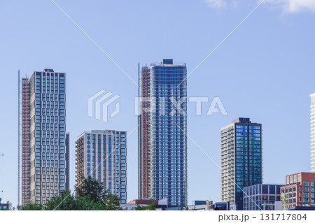 Modern skyscrapers rise over Canary Wharf in East London, United Kingdom. Modern skyscrapers rise over Canary Wharf in East London, United Kingdom. 131717804