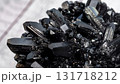 macro photo of black crystals with glass texture 131718212