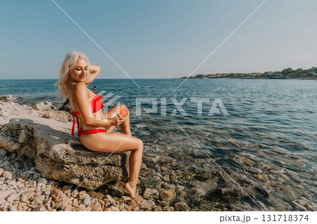 Woman Red Bikini Beach Relaxation: Seashore Summer Photo Shoot, Coastal Idyll 131718374
