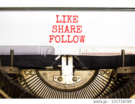 Like share follow symbol. Concept words Like Share Follow typed on beautiful old retro vintage typewriter. Beautiful white background. Business like share follow concept. Copy space. Like share follow symbol. Concept words Like Share Follow typed on beautiful old retro vintage typewriter. Beautiful white background. Business like share follow concept. Copy space. 131718780