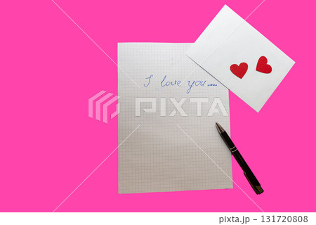 love letter, pen and envelote vith little paper hearts on pink background love letter, pen and envelote vith little paper hearts on pink background 131720808