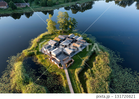 view from above of ancient wooden settlement on river island, recontruction of ancient architecture 131720821