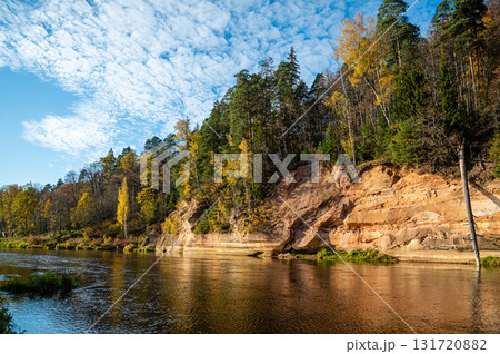 Devils rock and cave by the shores of the River Gauja, Sigulda, Latvia Devils rock and cave by the shores of the River Gauja, Sigulda, Latvia 131720882
