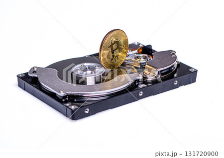 Bitcoin BTC on Hard Disk Drive, Hard drive with crypto currency, cryptocurrency business concept Bitcoin BTC on Hard Disk Drive, Hard drive with crypto currency, cryptocurrency business concept 131720900