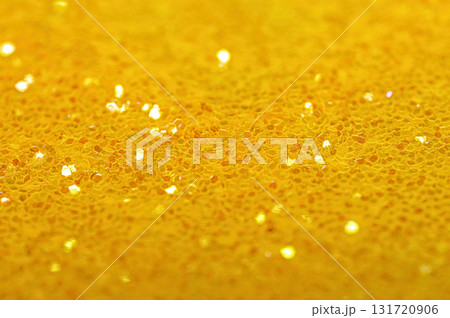 Abstract gold glitter sparkle confetti background, closeup 131720906