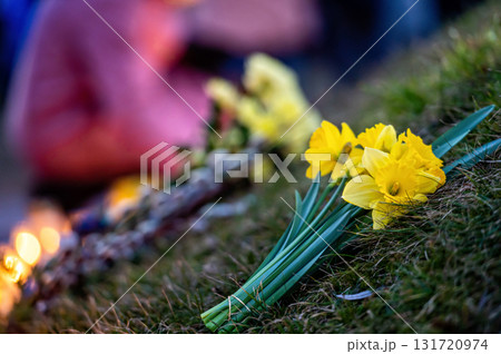Flowers and candles on streets for peace in Ukraine, symbolising to stop the war, closeup 131720974
