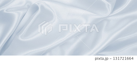 Smooth elegant grey silk or satin luxury cloth as wedding background. Luxurious Christmas background or New Year background design Smooth elegant grey silk or satin luxury cloth as wedding background. Luxurious Christmas background or New Year background design 131721664