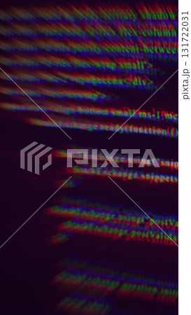 Abstract blurred motion of colorful RGB code lines resembling digital streaming data 131722031