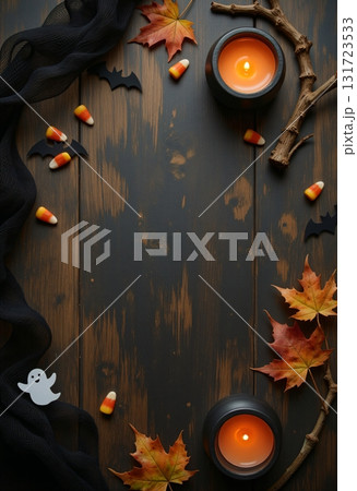 Halloween background with pumpkins, skull and spiders on rustic wood 131723533