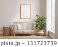 This blank frame for wall art mockup is set in a bright, modern nursery featuring a wooden crib and a neutral color scheme. 131723739