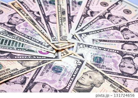Closeup of American dollar banknote texture, monetary, business and financial background Closeup of American dollar banknote texture, monetary, business and financial background 131724656