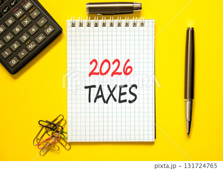 2026 taxes new year symbol. Concept words 2026 taxes on beautiful white note. Beautiful yellow background. Black pen. Beautiful black calculator. Business and 2026 taxes new year concept. Copy space. 2026 taxes new year symbol. Concept words 2026 taxes on beautiful white note. Beautiful yellow background. Black pen. Beautiful black calculator. Business and 2026 taxes new year concept. Copy space. 131724765