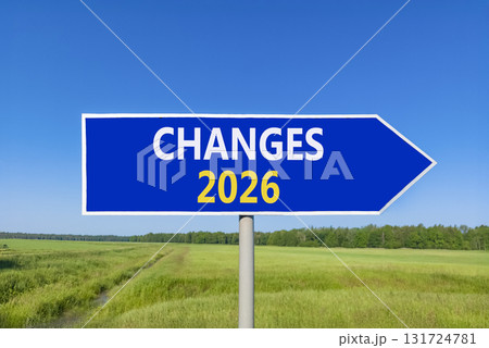 Changes 2026 symbol. Concept words Changes 2026 on beautiful blue road sign. Beautiful green grass field forest and blue sky background. Business and changes 2026 concept. Copy space. 131724781