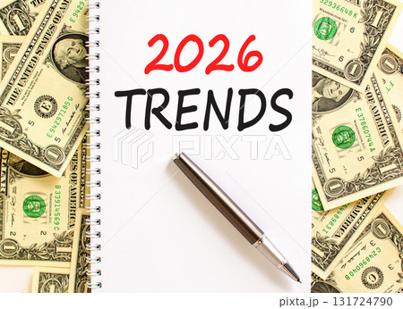 2026 Trends new year symbol. Concept words 2026 Trends on beautiful white note. Beautiful dollar bills background. Black pen. Dollar bills. Business and 2026 Trends new year concept. Copy space. 2026 Trends new year symbol. Concept words 2026 Trends on beautiful white note. Beautiful dollar bills background. Black pen. Dollar bills. Business and 2026 Trends new year concept. Copy space. 131724790