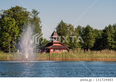 fountain in Lake Aluksne near Pilssala on a sunny summer afternoon, Aluksne, Vidzeme, Latvia 131724983