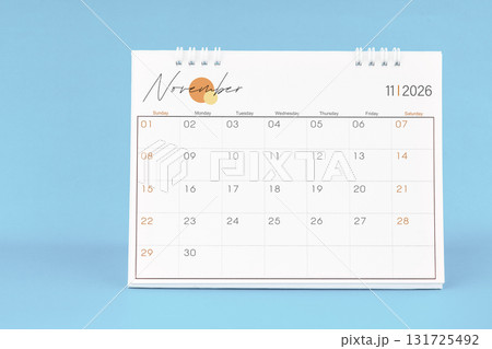 November 2026, Monthly desk calendar for 2026 year on Blue color background. November 2026, Monthly desk calendar for 2026 year on Blue color background. 131725492