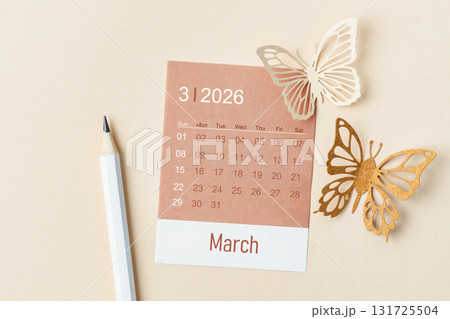 March 2026 calendar card for the organizer to plan and reminder and butterfly paper on yellow. March 2026 calendar card for the organizer to plan and reminder and butterfly paper on yellow. 131725504