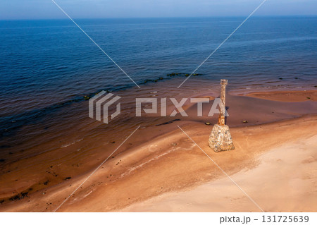 old ruins of Kurmrags Lighthouse on the shore of the Rigas Gulf, Baltic sea, Latvia 131725639