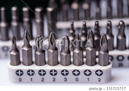 Interchangeable screwdriver bit set, isolated on white, selective focus, dof, closeup Interchangeable screwdriver bit set, isolated on white, selective focus, dof, closeup 131725717
