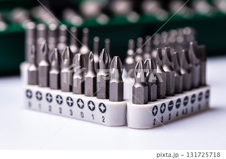 Interchangeable screwdriver bit set, isolated on white, selective focus, dof, closeup Interchangeable screwdriver bit set, isolated on white, selective focus, dof, closeup 131725718