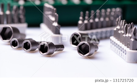Interchangeable screwdriver bit set, isolated on white, selective focus,  dof, closeup 131725720