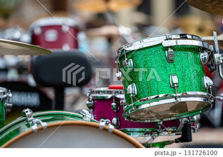 A set of plates in a drum set. At a concert of percussion music, selective focus, closeup 131726100