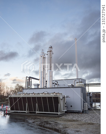 Modern Biogas Plant Facility in Denmark with Industrial buildings and chimneys 131727341
