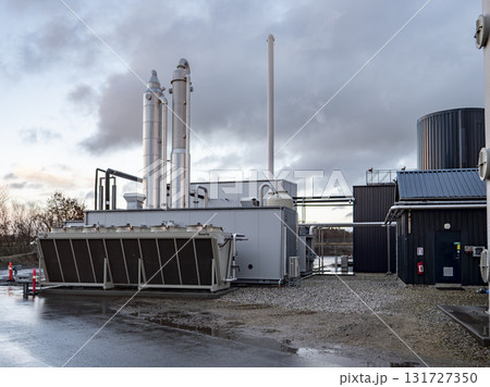 Modern Biogas Plant Facility in Denmark with Industrial buildings and Pipes 131727350