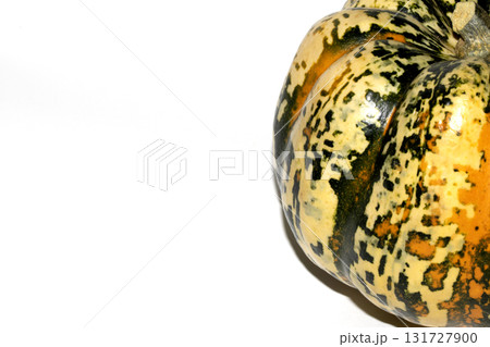 A spooky Halloween Pumpkin Squash in Unique Abstract Orange and Green Colours on White Background 131727900