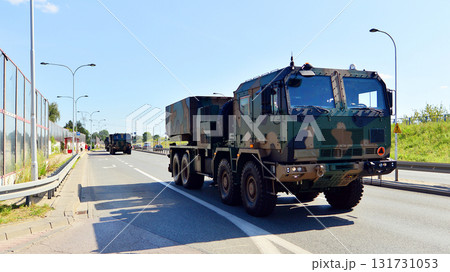 Warsaw, Poland. 15 August 2025. Polish army military convoy. Wheeled armored vehicles drive on highway. Warsaw, Poland. 15 August 2025. Polish army military convoy. Wheeled armored vehicles drive on highway. 131731053