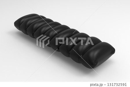 Black nylon inflatable pillow mattress with segmented pattern on white background Black nylon inflatable pillow mattress with segmented pattern on white background 131732591